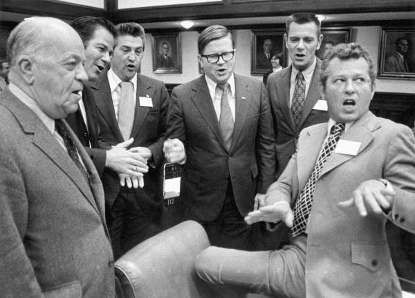 A group of Florida politicians singing together. 